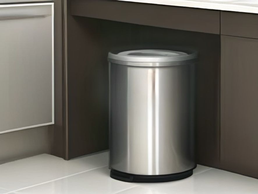Checking empty waste cans and surroundings for residual odors.