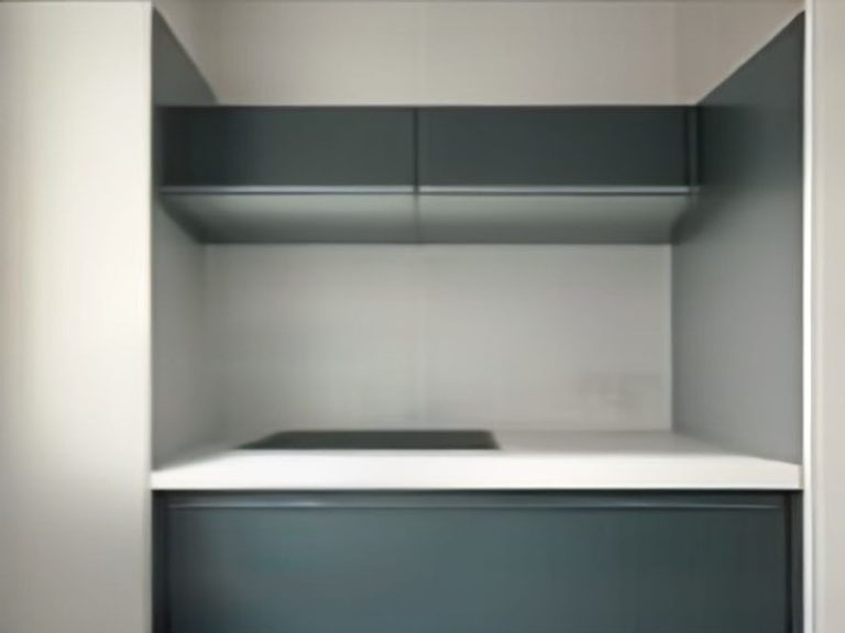 Non-permanent storage upgrades including tension rods and adhesive hooks in a cabinet