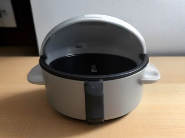 Clean nonstick rice cooker inner pot and open unit