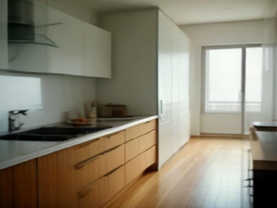 Clean and polished wooden kitchen cabinet doors in a bright modern kitchen