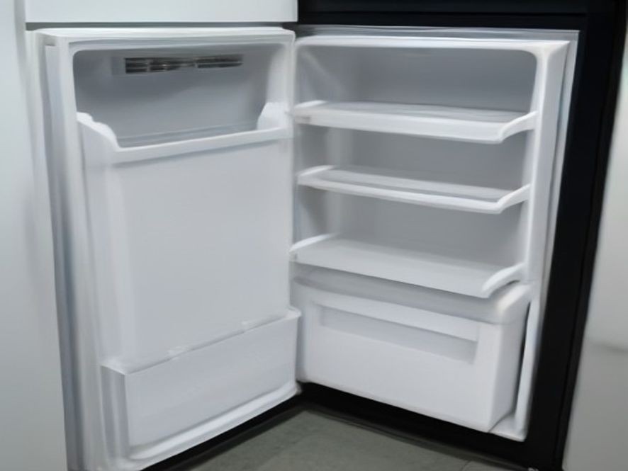 Dust-free refrigerator condenser coils at the base of the unit