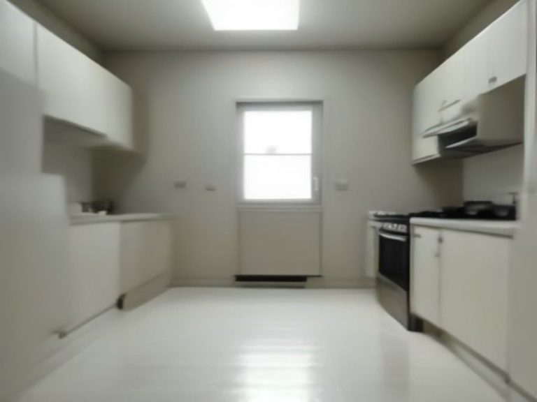 An empty rental kitchen deep-cleaned and prepared for move-out inspection.