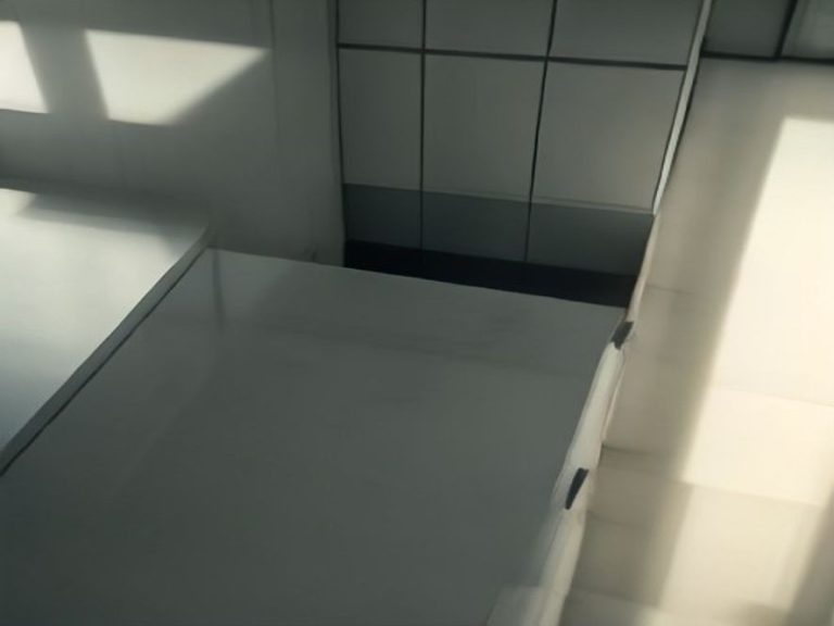 The upper surface of top kitchen cabinets cleaned thoroughly of dust and grease.