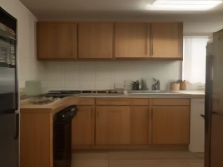 Heavy-duty pull-out shelf organizing small kitchen appliances inside a cabinet