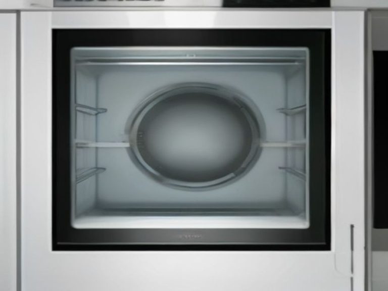 Polished oven door handle and sparkling front glass