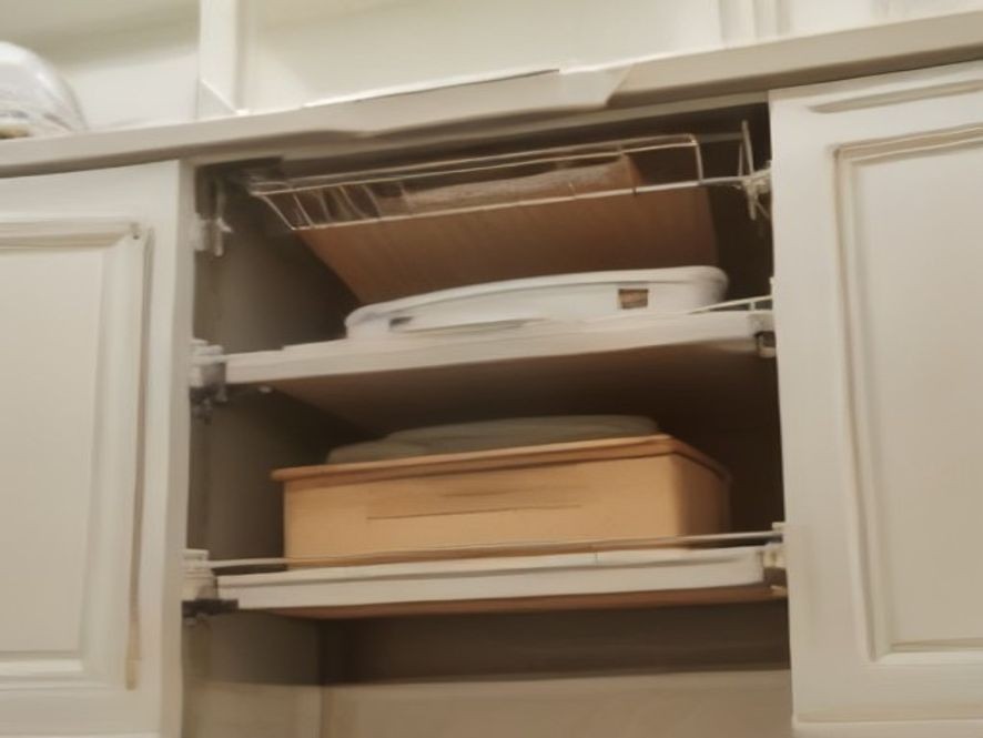 Vertical space maximized with shelf risers and under-shelf wire baskets