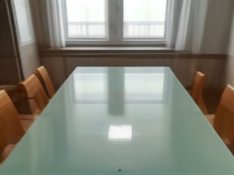 Removing dried food residue from glass kitchen tables