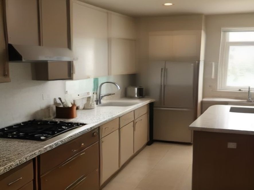 Clear kitchen counter surfaces for a clutter free workspace.