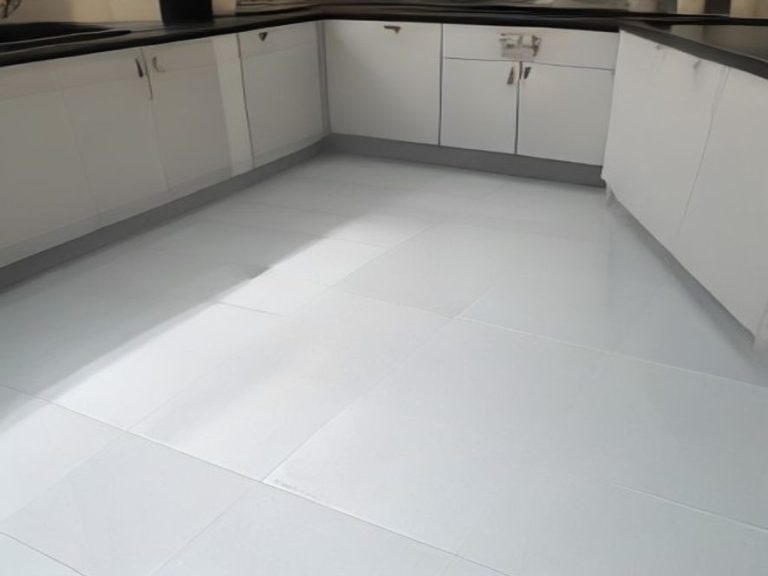 Immaculate ceramic tile kitchen floor with crisp grout lines