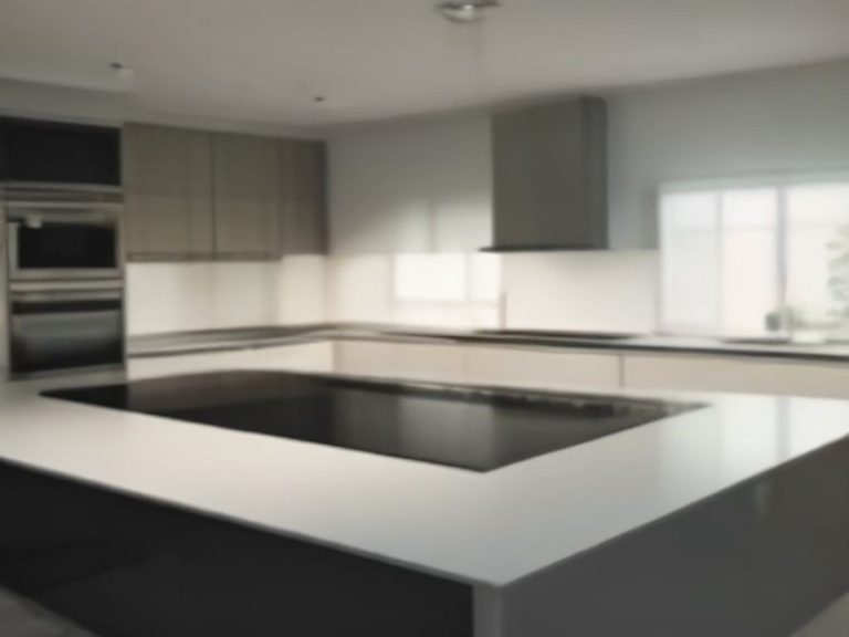 Sparkling clean glass cooktop and surrounding quartz counter surface