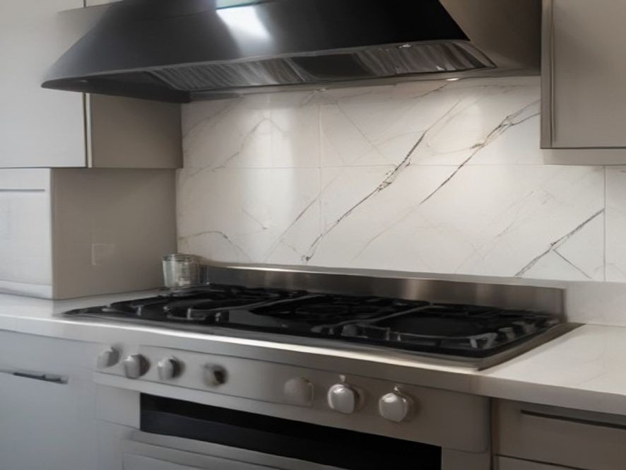 Removing grease splatters from glass kitchen backsplashes