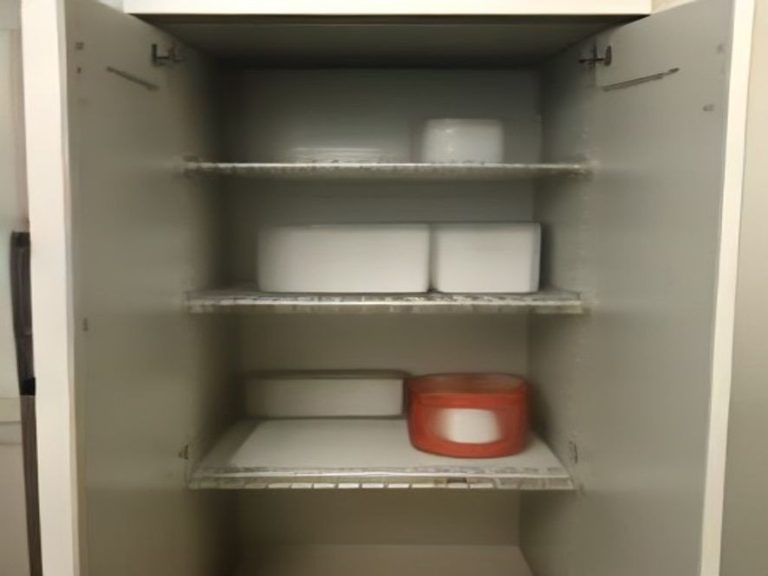 Upgraded small kitchen cabinet maximizing interior volume.