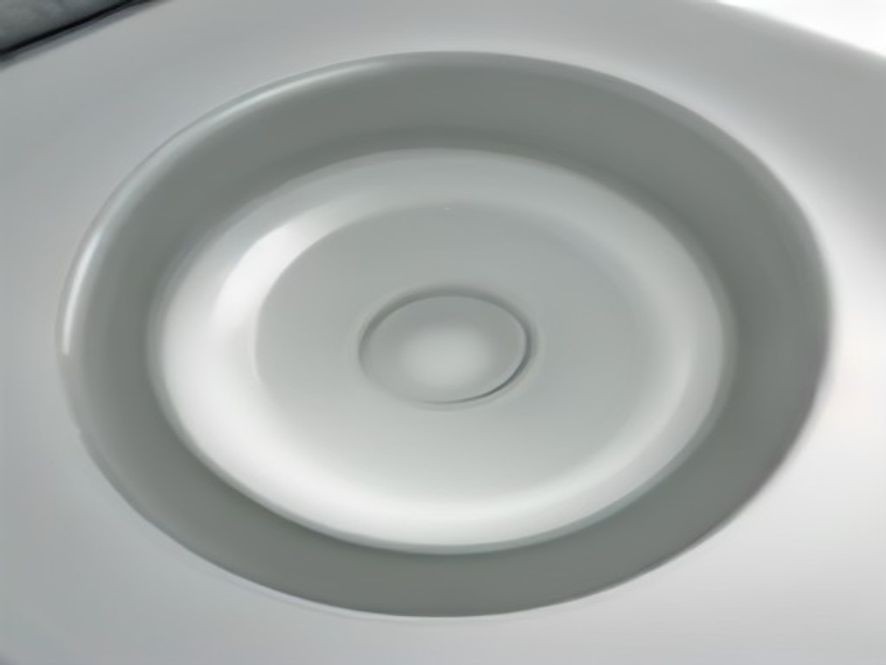 Close-up of a kitchen sink drain flange assembly